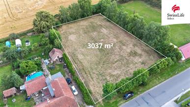 Prodej stavebního pozemku 3037 m2 Měník