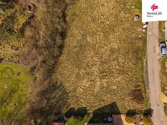 Prodej stavebního pozemku 1054 m2, Kly