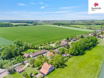 Prodej stavebního pozemku 857 m2 Benátky