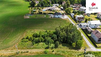 Prodej stavebního pozemku 1157 m2, Dvorce